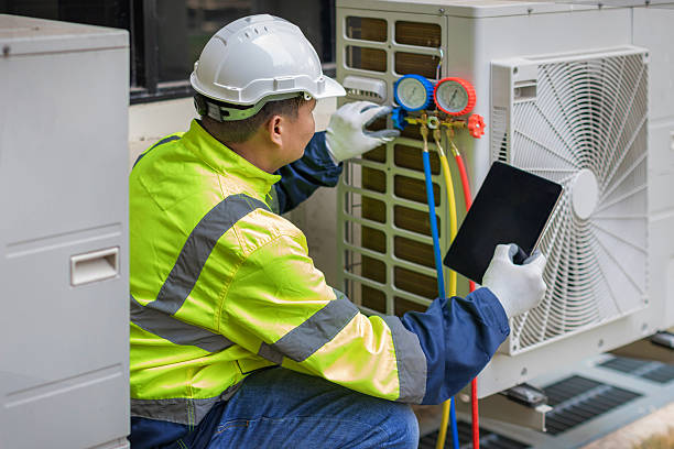 Professional Air Conditioning Repair technician working in Juniata, NE